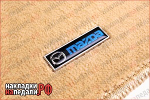 Эмблемы на коврики Mazda