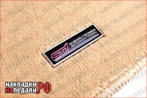 Эмблемы на коврики Subaru STi